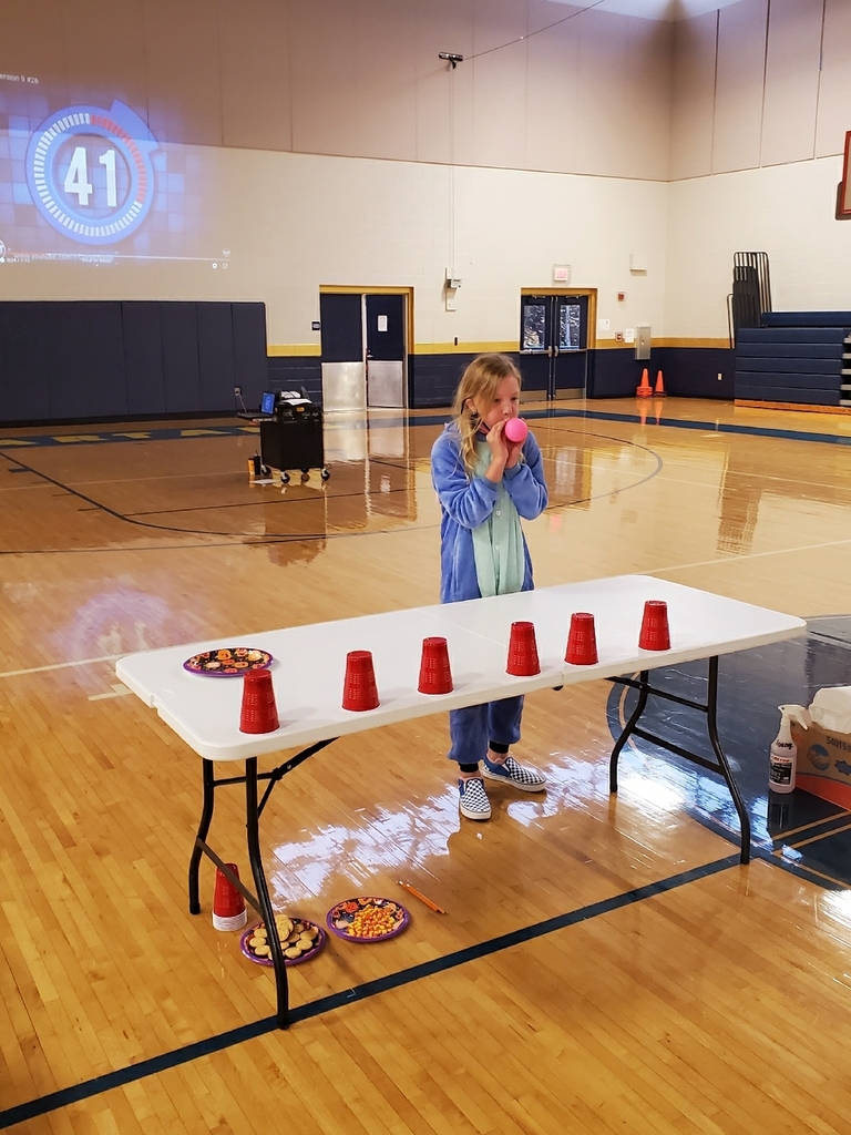 Anna Ring winner of the balloon blow the cups off the table challenge
